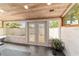 Spa-like bathroom with glass doors opening to a private backyard at 2162 Se Mill Creek Cir, Ocala, FL 34471