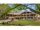 Two story home with screened porch and creek at 2162 Se Mill Creek Cir, Ocala, FL 34471