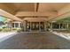 Elegant covered entryway with double doors at 2162 Se Mill Creek Cir, Ocala, FL 34471