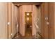 Powder room with wood walls and tiled floor at 2162 Se Mill Creek Cir, Ocala, FL 34471