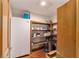 Well-organized pantry with ample shelving for storage at 2162 Se Mill Creek Cir, Ocala, FL 34471