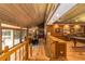 View from the stairs showing the dining area and game room at 2162 Se Mill Creek Cir, Ocala, FL 34471
