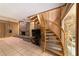 Unique wooden spiral staircase in the basement, leading to upper levels at 2162 Se Mill Creek Cir, Ocala, FL 34471