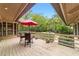 Relaxing deck overlooking the pool and wooded area at 2162 Se Mill Creek Cir, Ocala, FL 34471