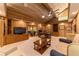 Spacious home office with ample built-in shelving and seating area at 2162 Se Mill Creek Cir, Ocala, FL 34471