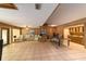 Spacious basement recreation area with ping pong table and wet bar at 2162 Se Mill Creek Cir, Ocala, FL 34471