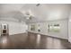 Bright living room with hardwood floors and a ceiling fan at 4725 Sw 62Nd St, Ocala, FL 34474