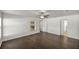 Main bedroom with hardwood floors and en-suite bathroom at 4725 Sw 62Nd St, Ocala, FL 34474