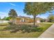 Single-Gathering home with a two-car garage and manicured lawn at 4725 Sw 62Nd St, Ocala, FL 34474