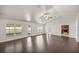 Spacious living room with hardwood floors and views to the backyard at 4725 Sw 62Nd St, Ocala, FL 34474