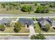Aerial view of a house with a gray roof and solar panels at 4725 Sw 62Nd St, Ocala, FL 34474