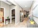 Hallway with tile floors, and neutral walls, with access to bedrooms and bath at 5662 Nw 40Th Pl, Ocala, FL 34482