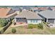 Home with screened patio, backyard, and landscaping at 5662 Nw 40Th Pl, Ocala, FL 34482