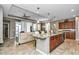 Open kitchen with granite island, perfect for entertaining at 5662 Nw 40Th Pl, Ocala, FL 34482