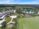 Resort-style clubhouse with pool and lake at 5662 Nw 40Th Pl, Ocala, FL 34482