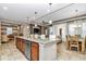 Open concept kitchen with large island and breakfast area at 5662 Nw 40Th Pl, Ocala, FL 34482