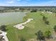 Aerial view of golf course and lake at 5662 Nw 40Th Pl, Ocala, FL 34482