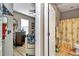 Guest bathroom with shower/tub combo and nautical-themed decor at 5662 Nw 40Th Pl, Ocala, FL 34482
