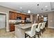 Island kitchen with granite countertops and stainless steel appliances at 5662 Nw 40Th Pl, Ocala, FL 34482