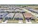 Houses with gray and brown roofs in a residential area at 5662 Nw 40Th Pl, Ocala, FL 34482