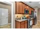 Well-equipped kitchen with granite countertops and ample cabinetry at 5662 Nw 40Th Pl, Ocala, FL 34482