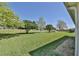 Backyard with a view of trees and a golf course at 2093 Nw 50Th Cir, Ocala, FL 34482