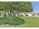 Ranch style home with mature landscaping and large tree at 2093 Nw 50Th Cir, Ocala, FL 34482