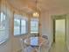 Charming breakfast nook with round table and white chairs at 2093 Nw 50Th Cir, Ocala, FL 34482
