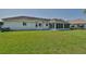 Spacious backyard with green lawn and home view at 2093 Nw 50Th Cir, Ocala, FL 34482