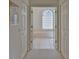 Bathroom with a large tub, glass block window and tiled floor at 2093 Nw 50Th Cir, Ocala, FL 34482