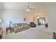 Spacious living room with comfy seating and large windows at 2093 Nw 50Th Cir, Ocala, FL 34482