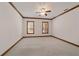 Large bedroom with two windows and a ceiling fan at 7086 Se 12Th Cir, Ocala, FL 34480