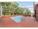 Relaxing screened pool with brick decking at 7086 Se 12Th Cir, Ocala, FL 34480