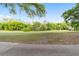 Landscaped green space with golf course view at 7086 Se 12Th Cir, Ocala, FL 34480