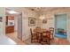 Cozy breakfast nook with a round table and chairs, adjacent to the kitchen at 735 Se 22Nd Ave, Ocala, FL 34471