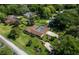 Aerial view of home with pool, showcasing large lot and neighborhood at 735 Se 22Nd Ave, Ocala, FL 34471