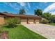 Three-car garage with paver driveway at 735 Se 22Nd Ave, Ocala, FL 34471