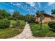 Brick walkway leading to home's entrance at 735 Se 22Nd Ave, Ocala, FL 34471