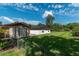 Large backyard with shed and pool enclosure at 735 Se 22Nd Ave, Ocala, FL 34471