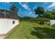 Landscaped backyard, offering privacy and space at 735 Se 22Nd Ave, Ocala, FL 34471