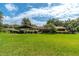 Ranch-style home with well-manicured lawn at 735 Se 22Nd Ave, Ocala, FL 34471
