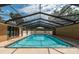 Inviting screened pool, ideal for summer fun at 735 Se 22Nd Ave, Ocala, FL 34471