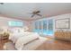 Main bedroom with pool view, large windows, and plenty of natural light at 735 Se 22Nd Ave, Ocala, FL 34471