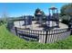 playground with play structures and fenced area at 5598 Sw 39Th St, Ocala, FL 34474