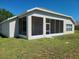 House with screened patio and large backyard at 5598 Sw 39Th St, Ocala, FL 34474