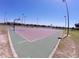 Outdoor basketball court with two hoops and ample space at 5598 Sw 39Th St, Ocala, FL 34474