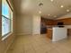 Kitchen features wood cabinets and a breakfast nook area at 5598 Sw 39Th St, Ocala, FL 34474