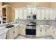 Renovated kitchen, featuring stainless steel appliances and granite countertops at 9029 Laurel Ridge Dr, Mount Dora, FL 32757