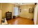 Bright bedroom with hardwood floors, large windows and ample space at 9029 Laurel Ridge Dr, Mount Dora, FL 32757