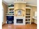 Built-in entertainment center with a stone fireplace at 9029 Laurel Ridge Dr, Mount Dora, FL 32757